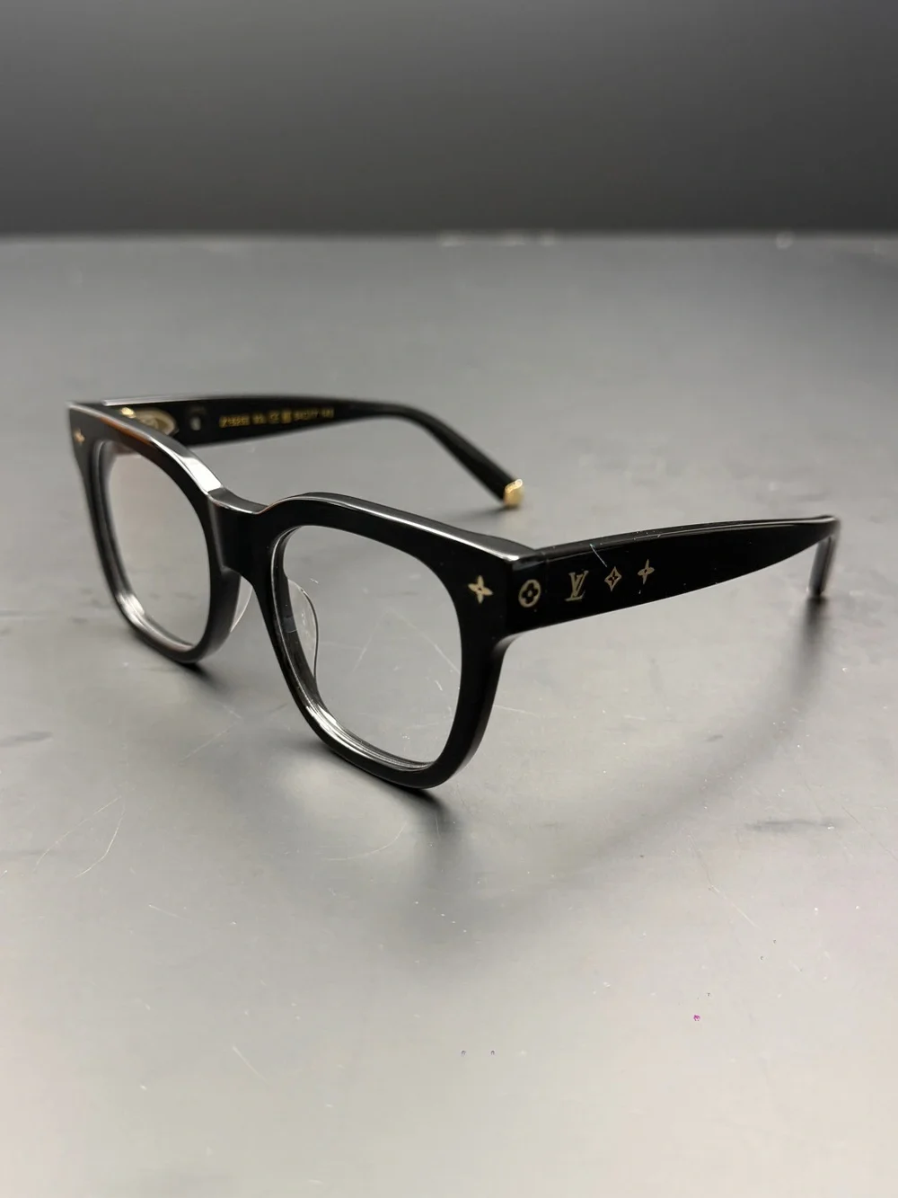 Louis Vuitton Black Frame Glasses with Gold Accents